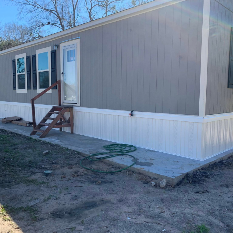 Mobile home skirting installation by Over The Top Construction LLC